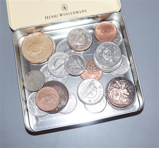 A collection of UK and World currency, including silver proof coins and commemorative crowns